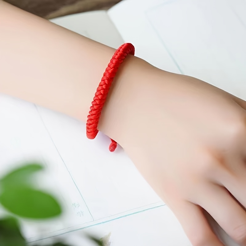 Red Rope Bracelet with Powerful Knot for Casual Attire or as Gift